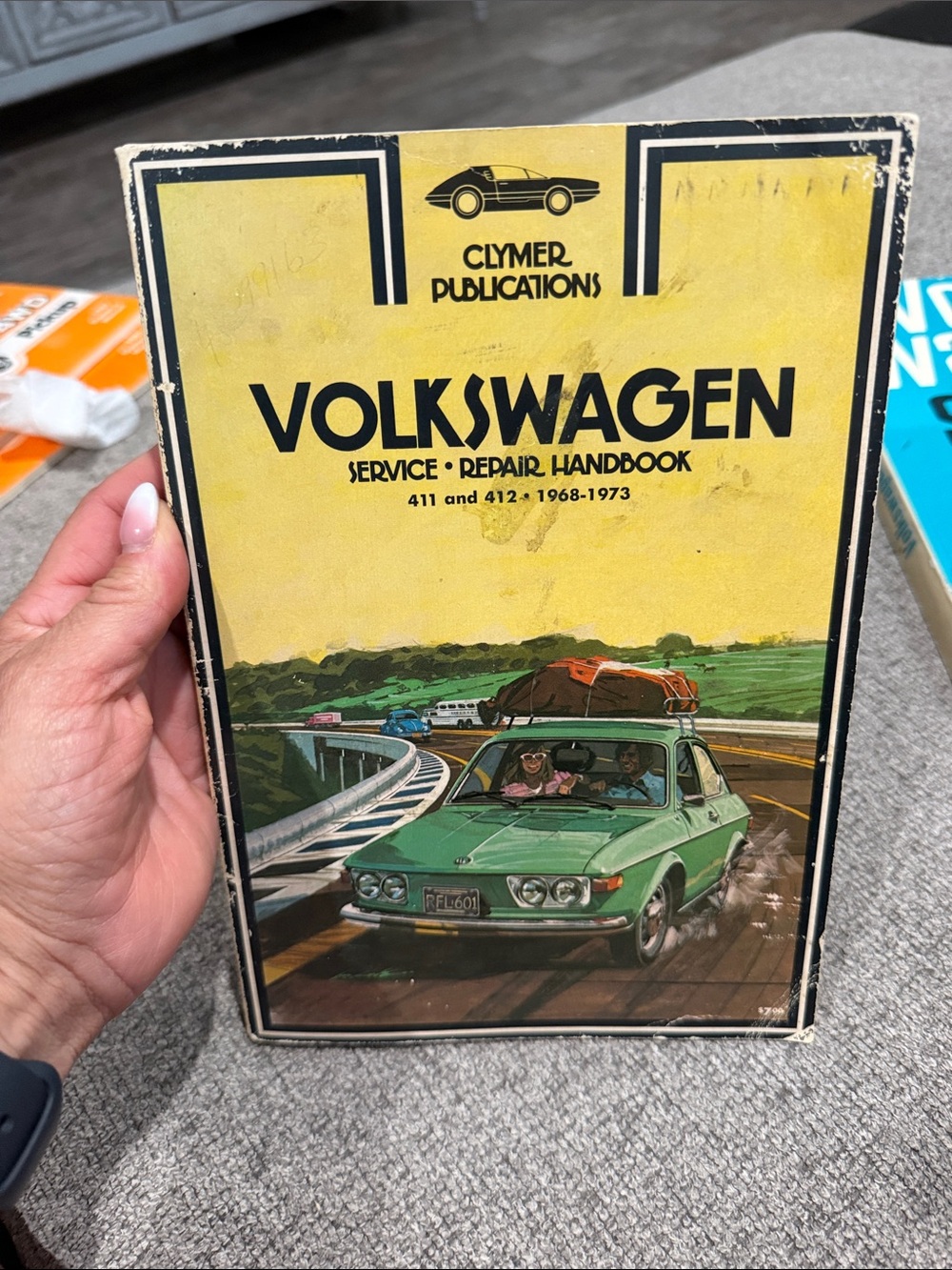 Volkswagen Service & Repair Handbook – Yellow Cover with Green Car Illustration